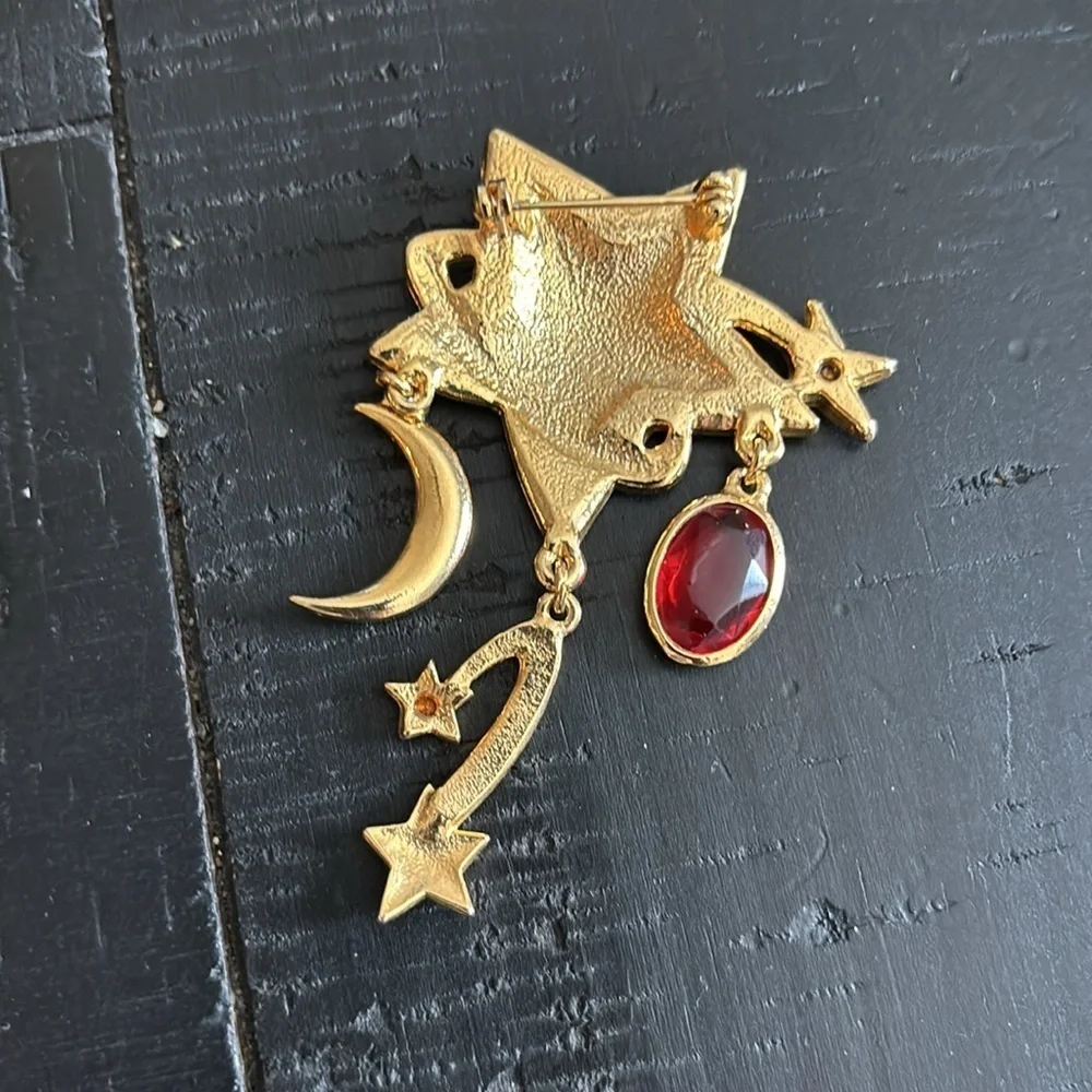Gold Celestial Dangle Star and Moon Brooch with Red Gemstone​